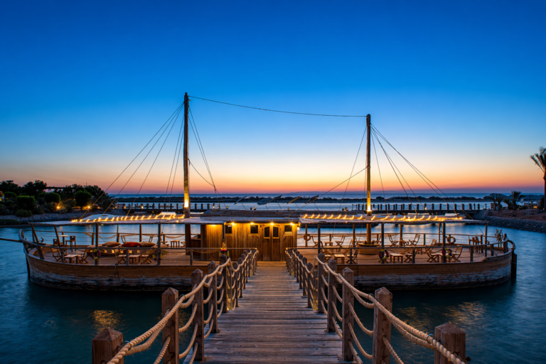 Twilight harbor dock with sunset glow